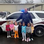 New Albany Police Department Visits Rainbow Learning Center Photos from New Albany Main Street Association's post