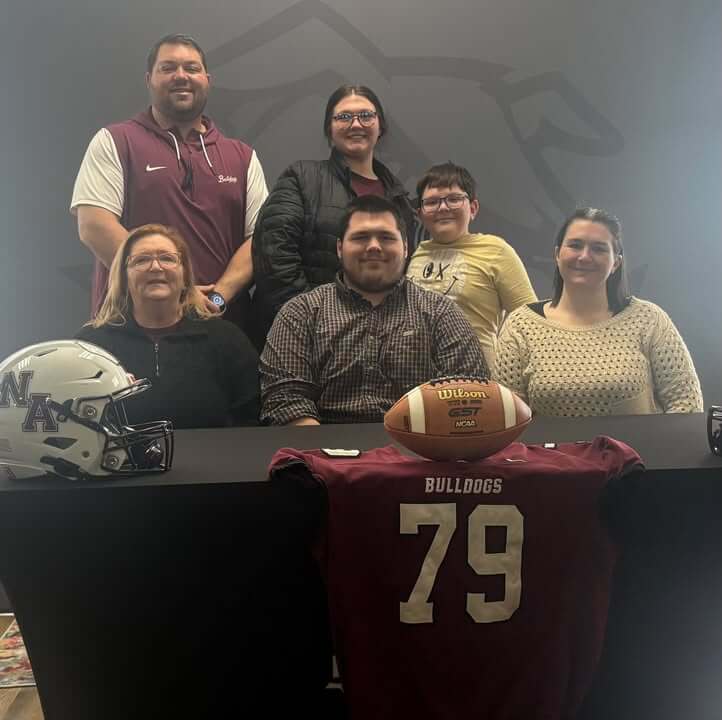 New Albany Bulldog Football Player Sam Morton signed to play community college football on Wednesday