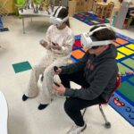 Second graders at NAES explore virtual reality as new learning tool Second grade students at NAES are learning how to use Virtual Reality headsets as an engaging learni