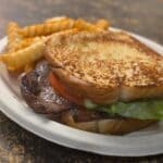Ribeye steak sandwich offers bold steakhouse flavor in every bite Ribeye Steak Sandwhich brings big steakhouse flavor to every bite, with rich, savory ribeye stacked